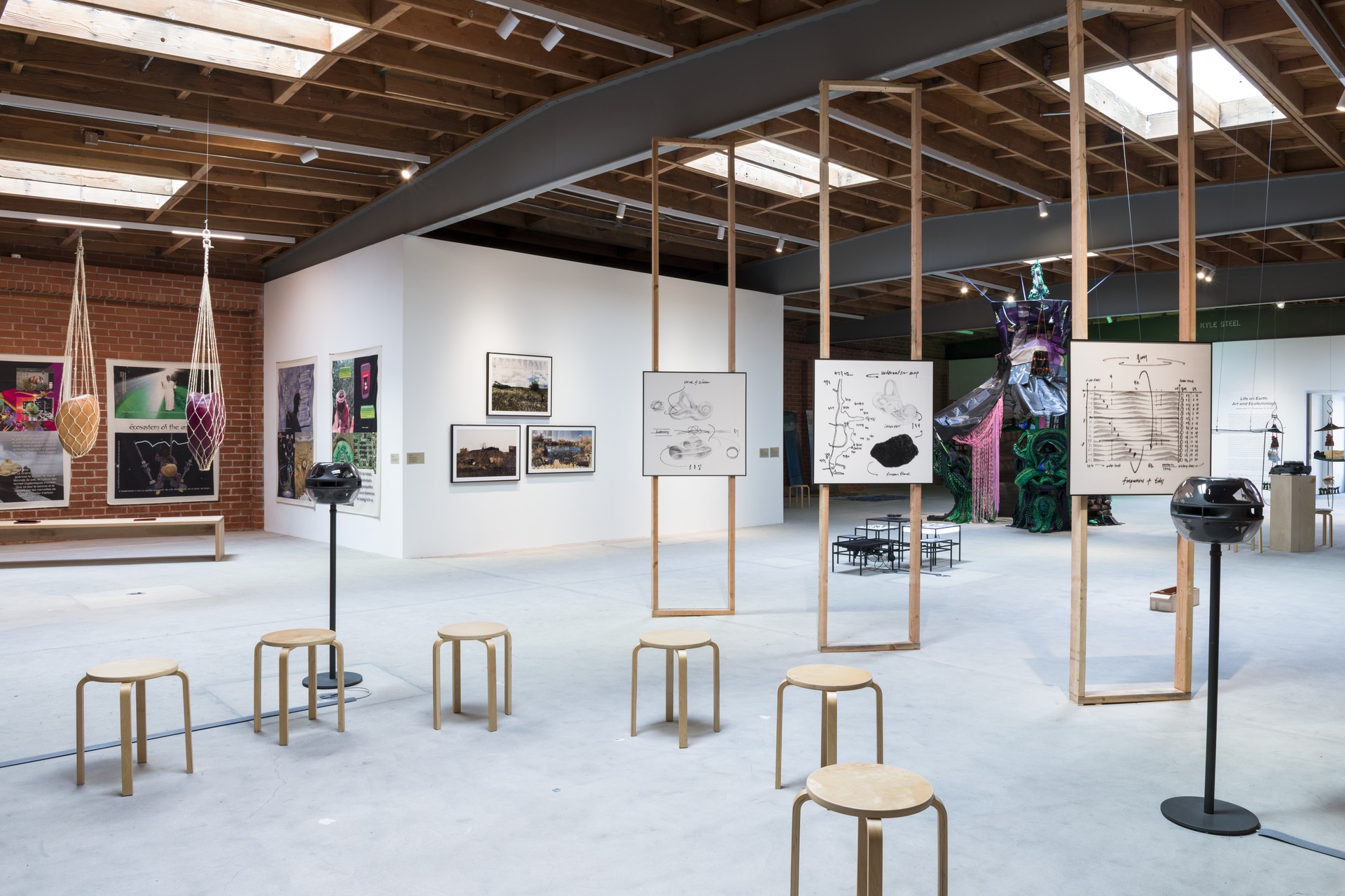 Gallery view of Life on Earth: Art & Ecofeminism at The Brick, Los Angeles, 2024 — showing multiple works in the exhibition space including Masumi Hayashi's EPA Superfund panoramas